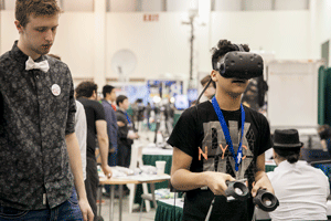 Employer assists student with virtual reality game