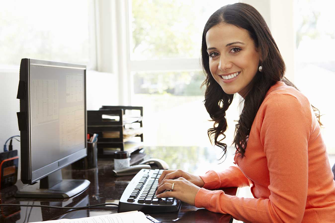 Hispanic woman searching for work online | Job Search Trends West Michigan